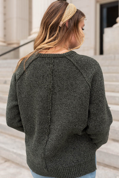 Back view  of the dark olive knitted sweater