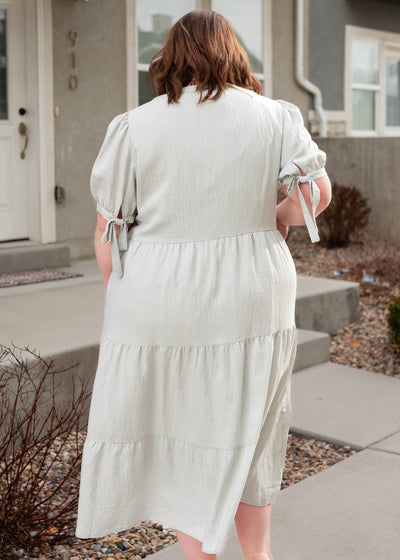 Back view of the plus size light blue tiered dress