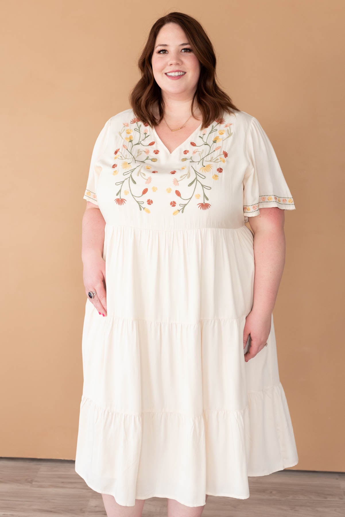 Short sleeve ivory embroidered tiered dress in plus size