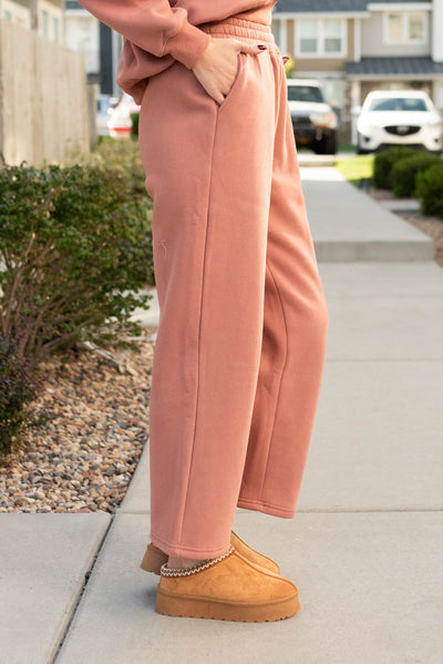 Side view of the dusty rose sweat pants