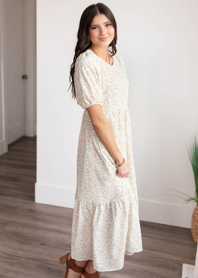 Side view of the orange floral dress