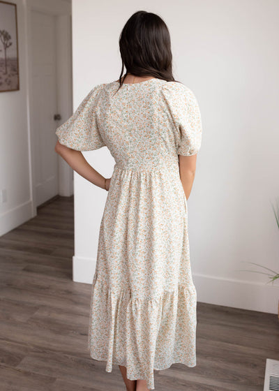 Back view of the orange floral dress