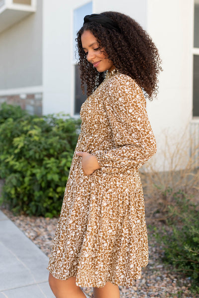 Side view of the chestnut floral smocked dress