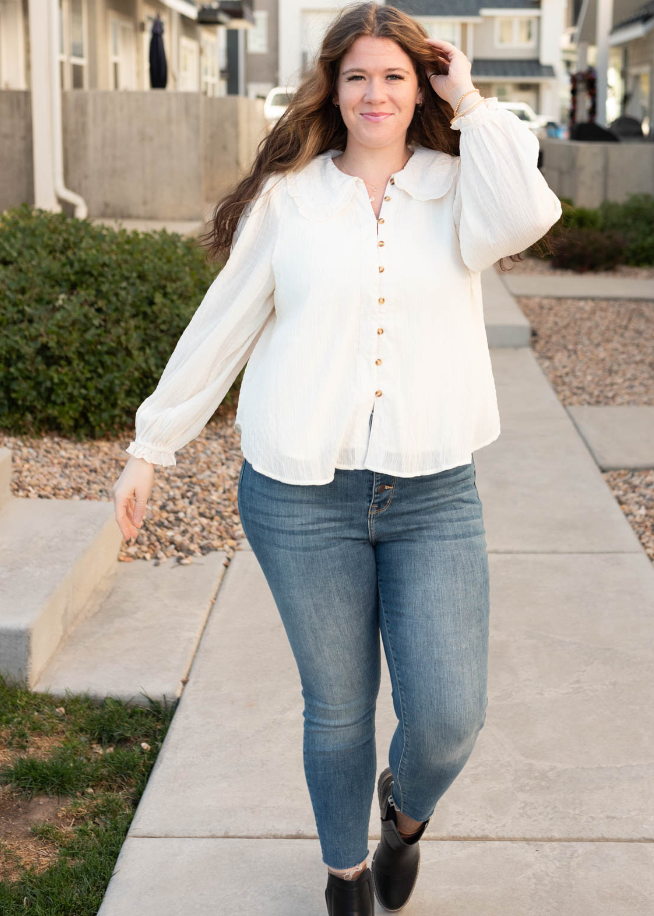 Button up cream long sleeve top with ruffle cuffs