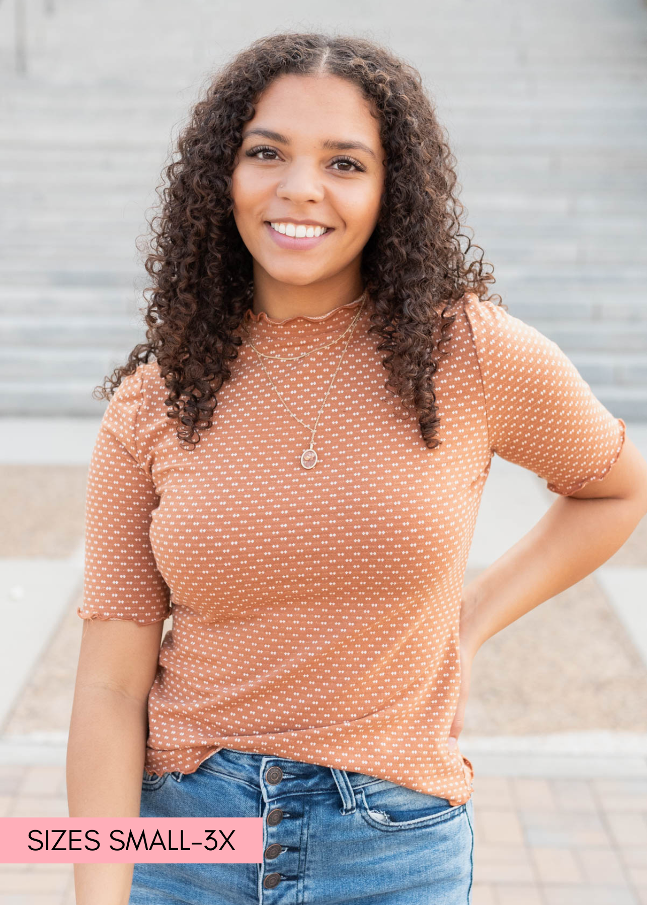 Close up of the camel dot texture top