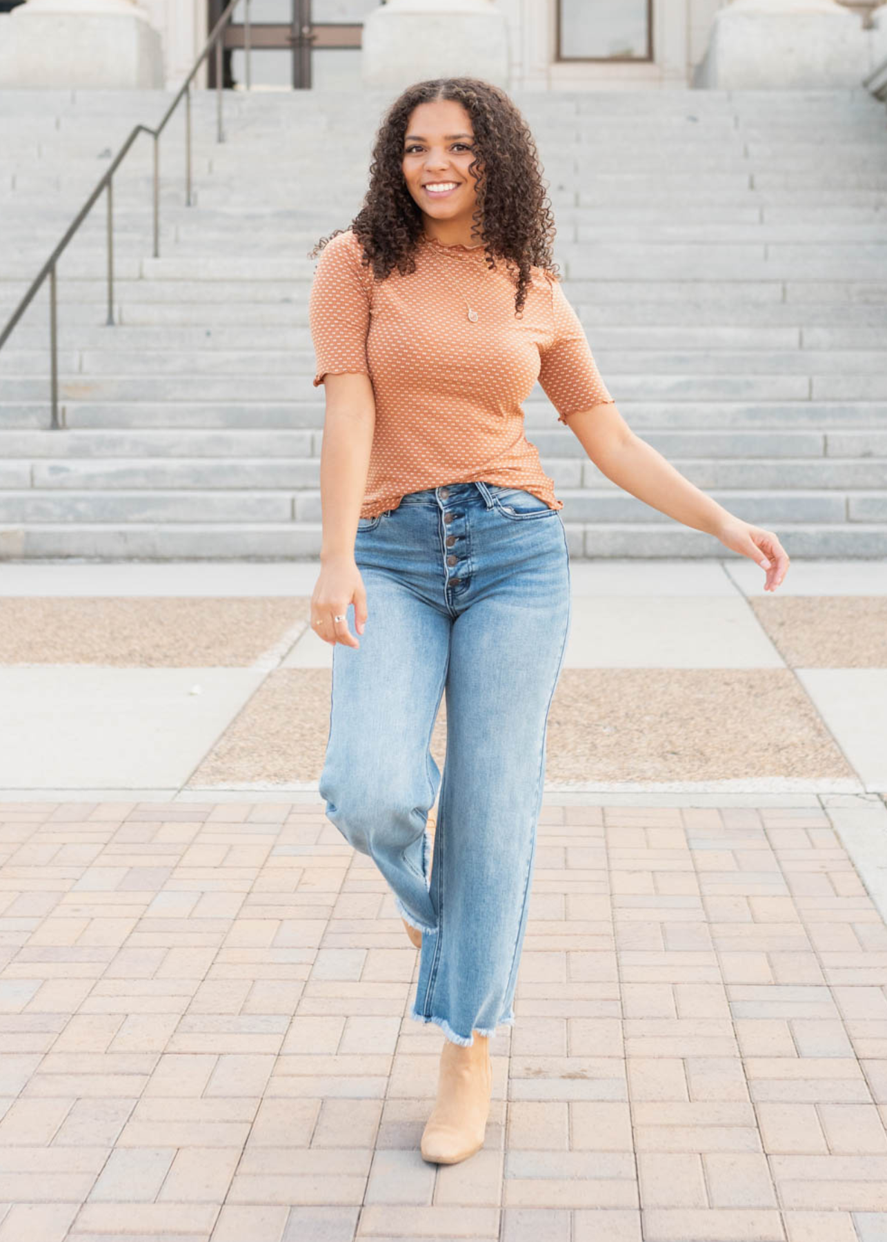 Ruffle hems on the camel dot texture top