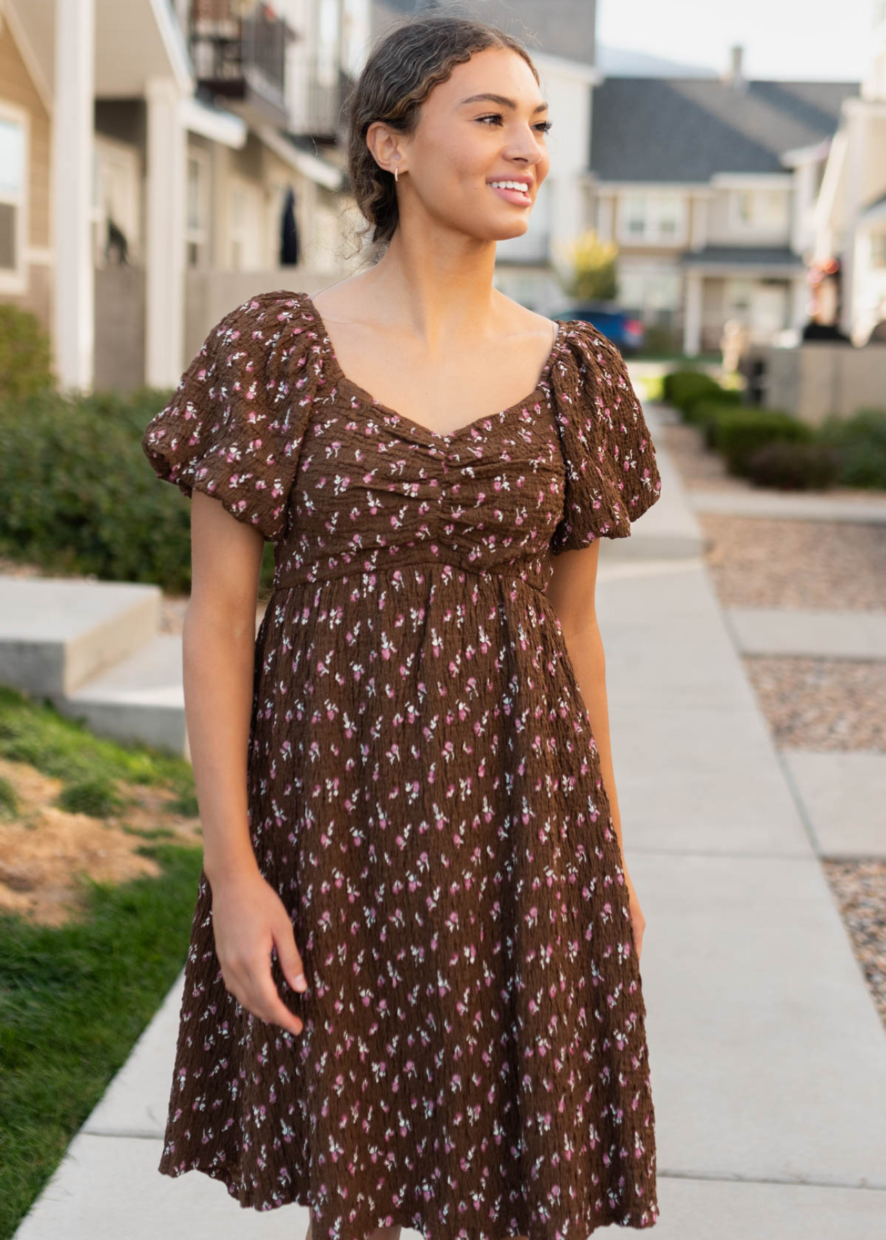 Brown floral dress with gathering at the bust