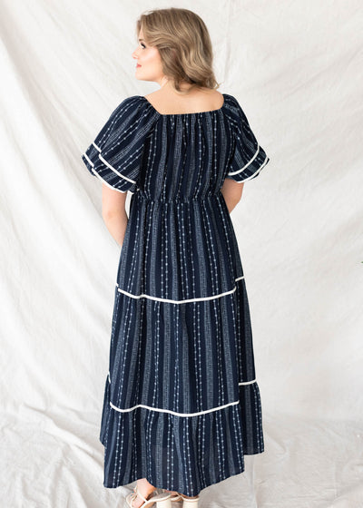 Back view of the navy pattern dress