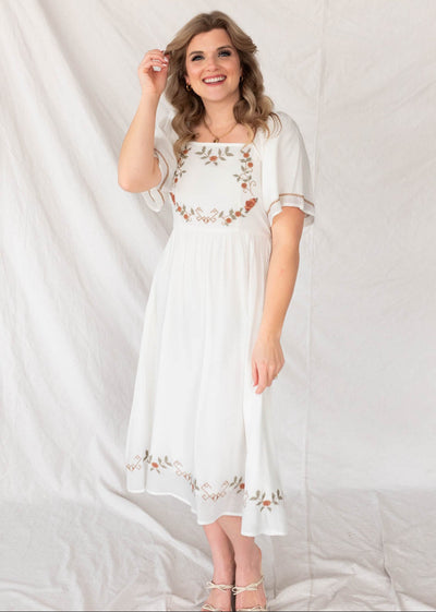 White embroidered dress with short sleeves