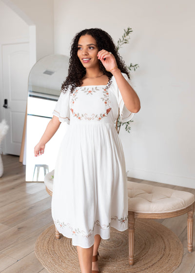 White embroidered dress with short sleeves