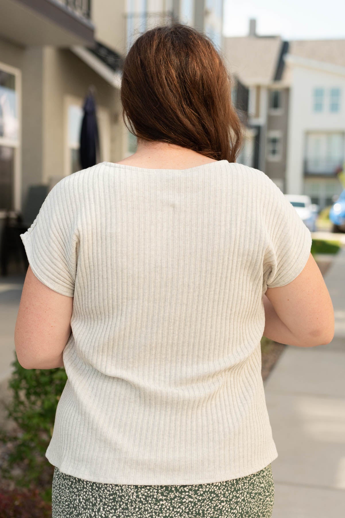 Back view of the plus size light grey ribbed top