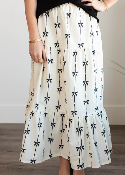 Tiered ivory bow printed skirt