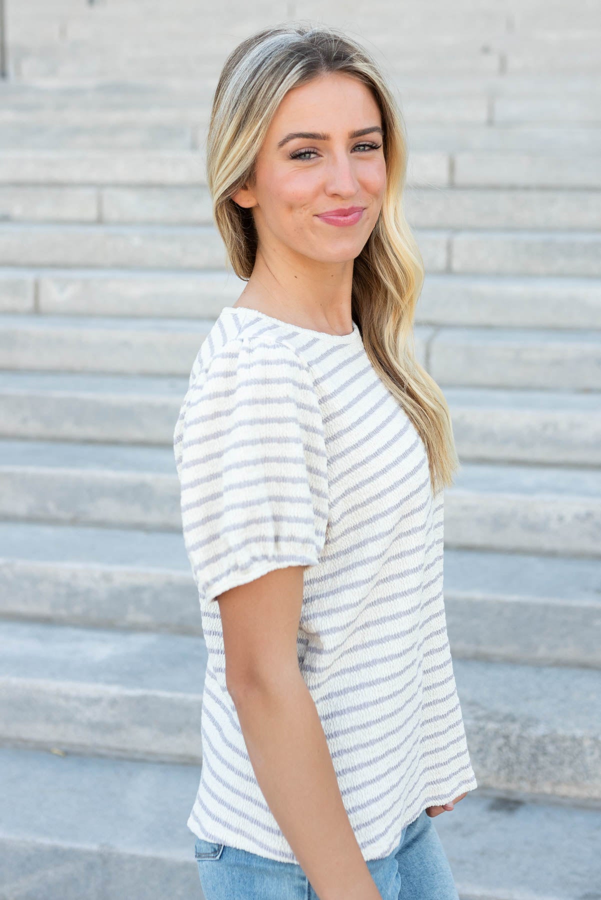 Side view of the dusty purple stripe top