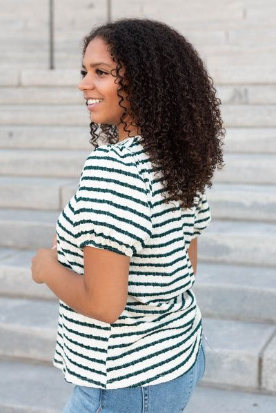 Side view of the emerald stripe textured top