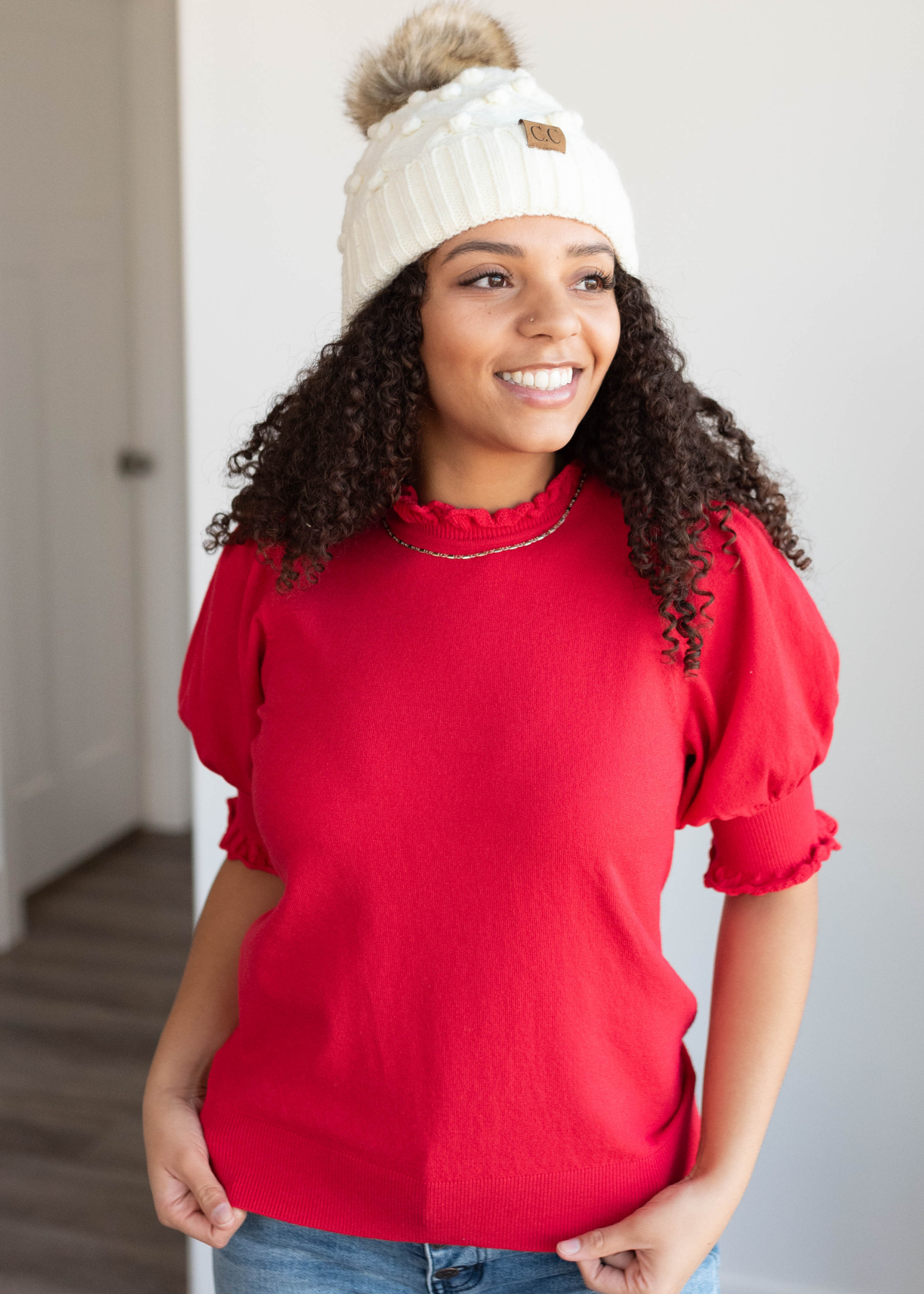 Red puff sleeve sweater top with a wide ruffle cuff