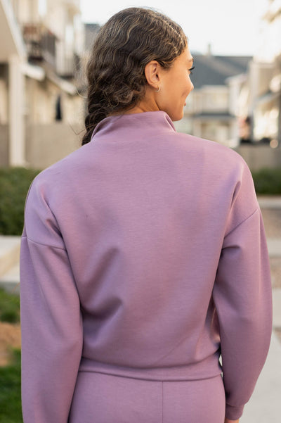 Back view of the plum fleece quarter zip sweater