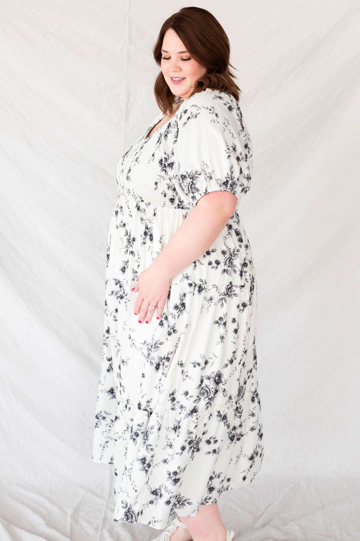 Side view of the ivory floral tiered dress in plus size