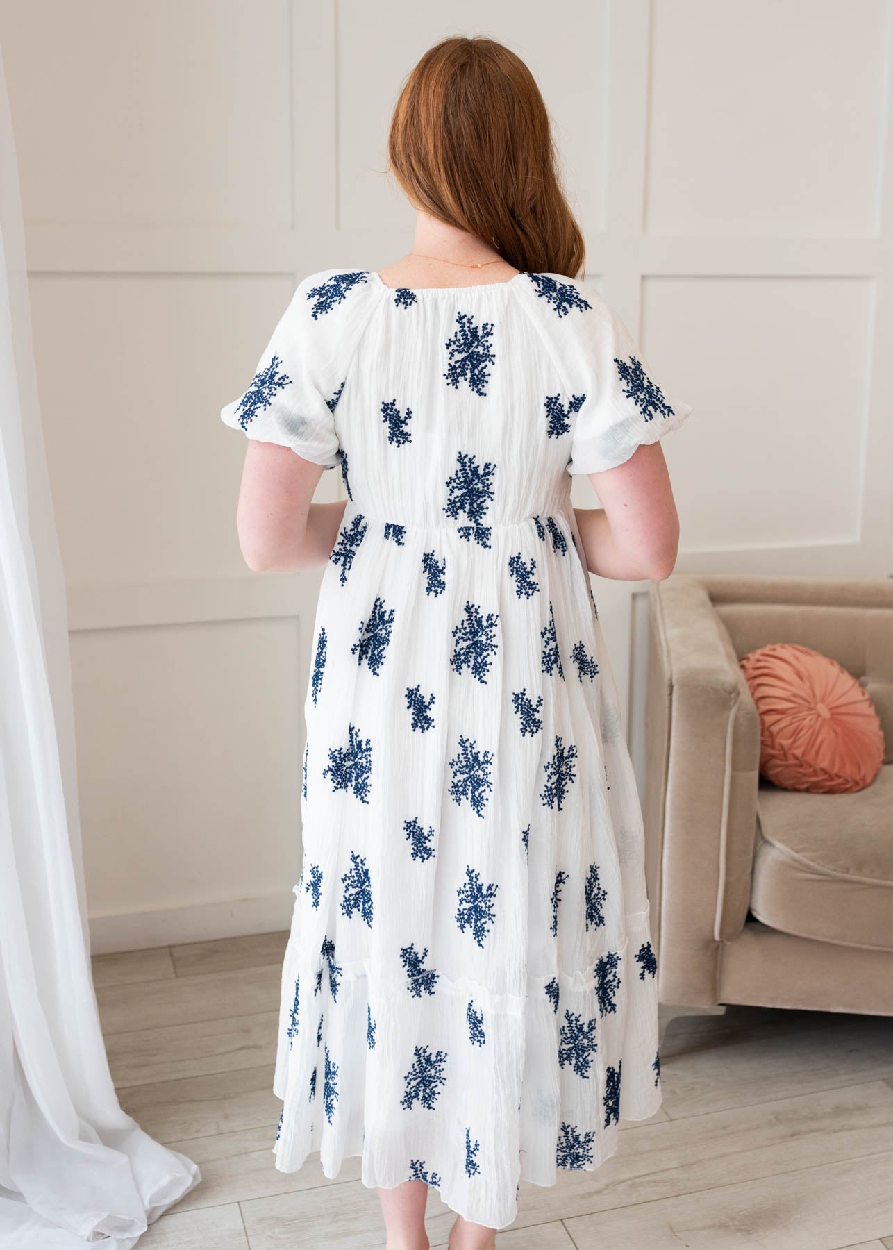 Back view of the ivory embroidered dress