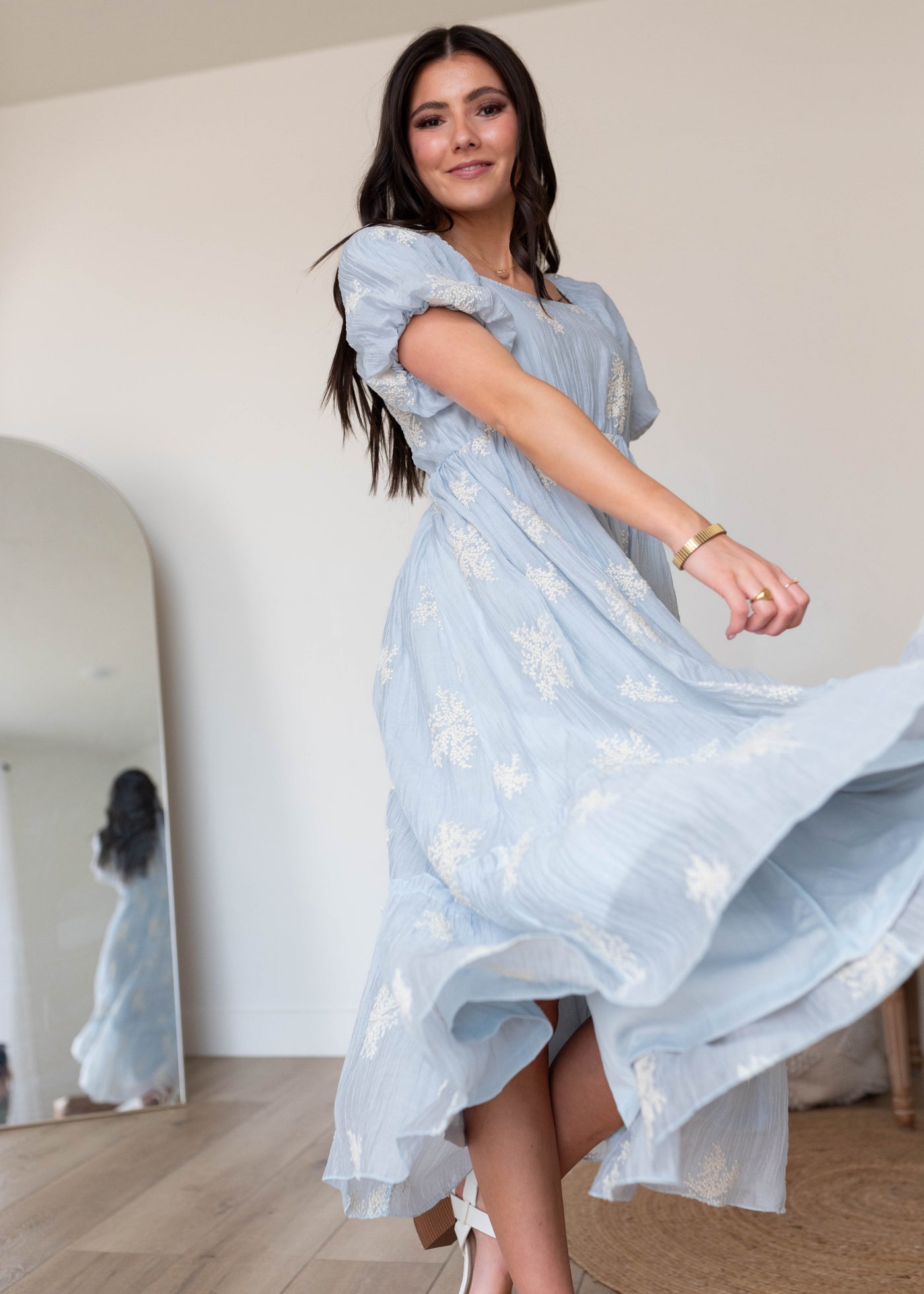 Small light blue embroidered dress