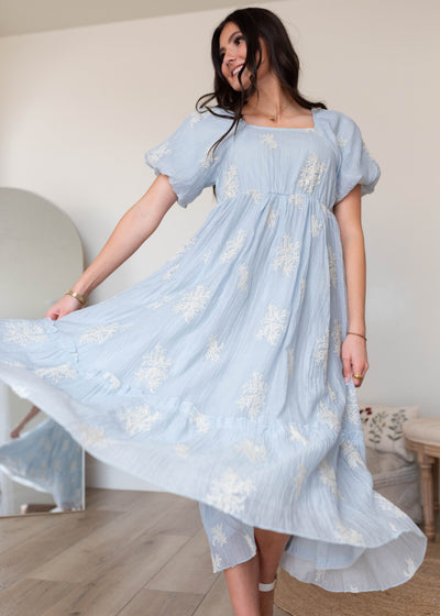 Light blue embroidered dress with full skirt