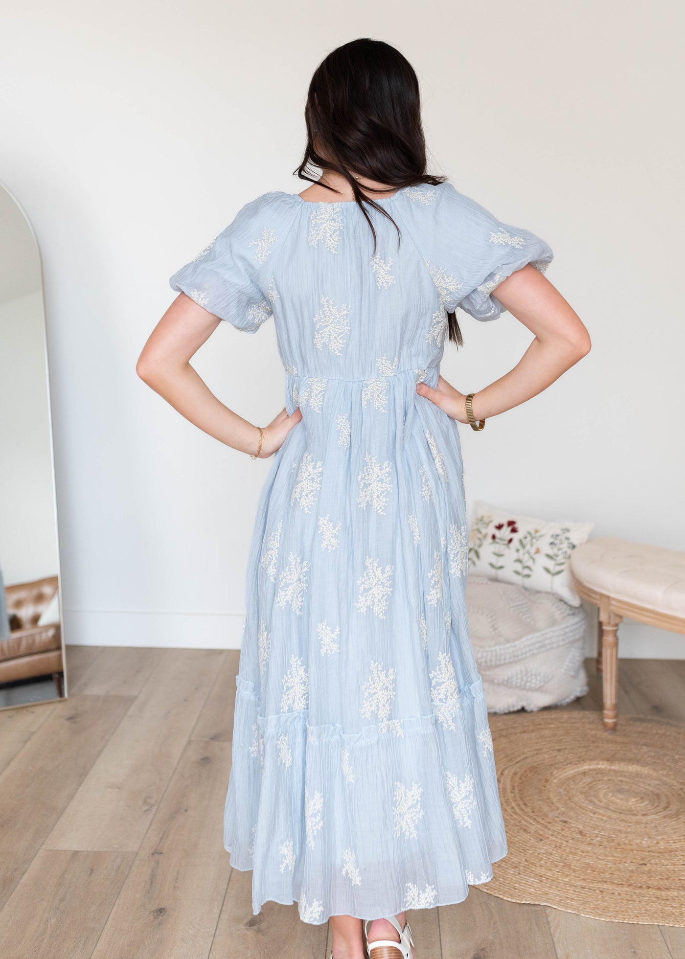 Back view of the light blue embroidered dress