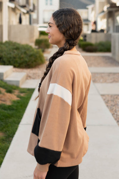 Side view of the mocha color block pullover