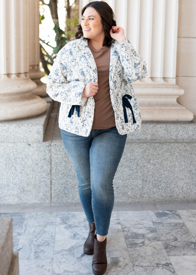 Long sleeve cream floral printed jacket in plus size