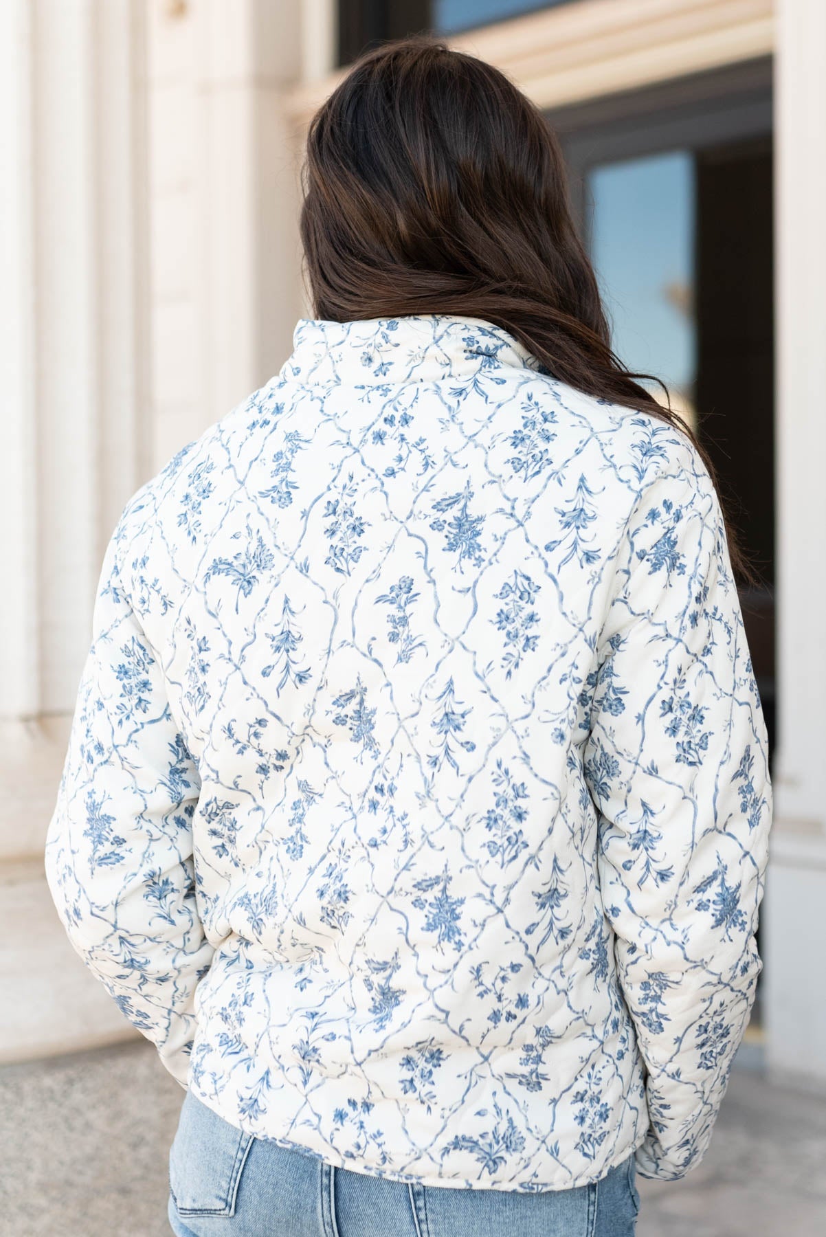 Back view of the cream floral printed jacket