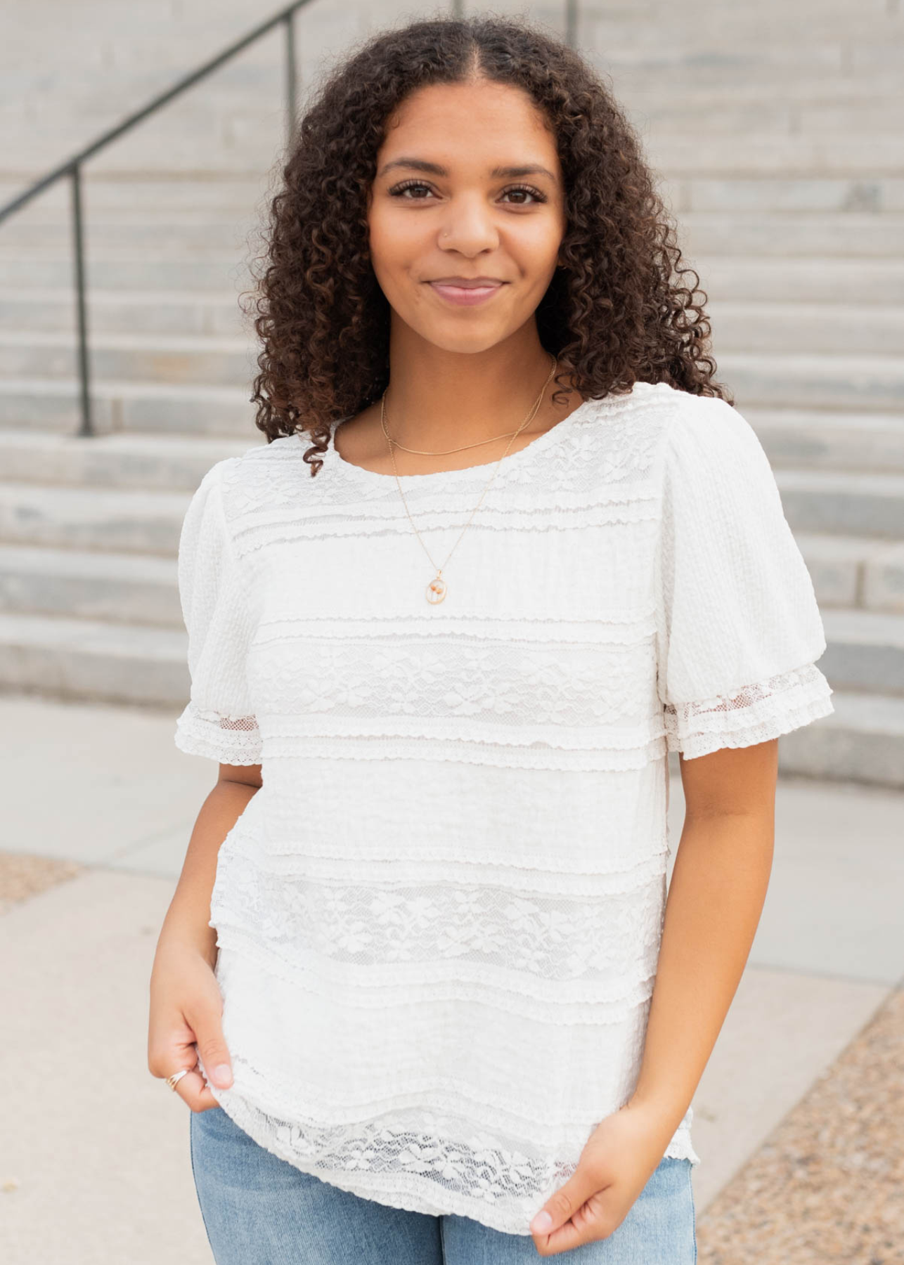 Front view of the white lace top