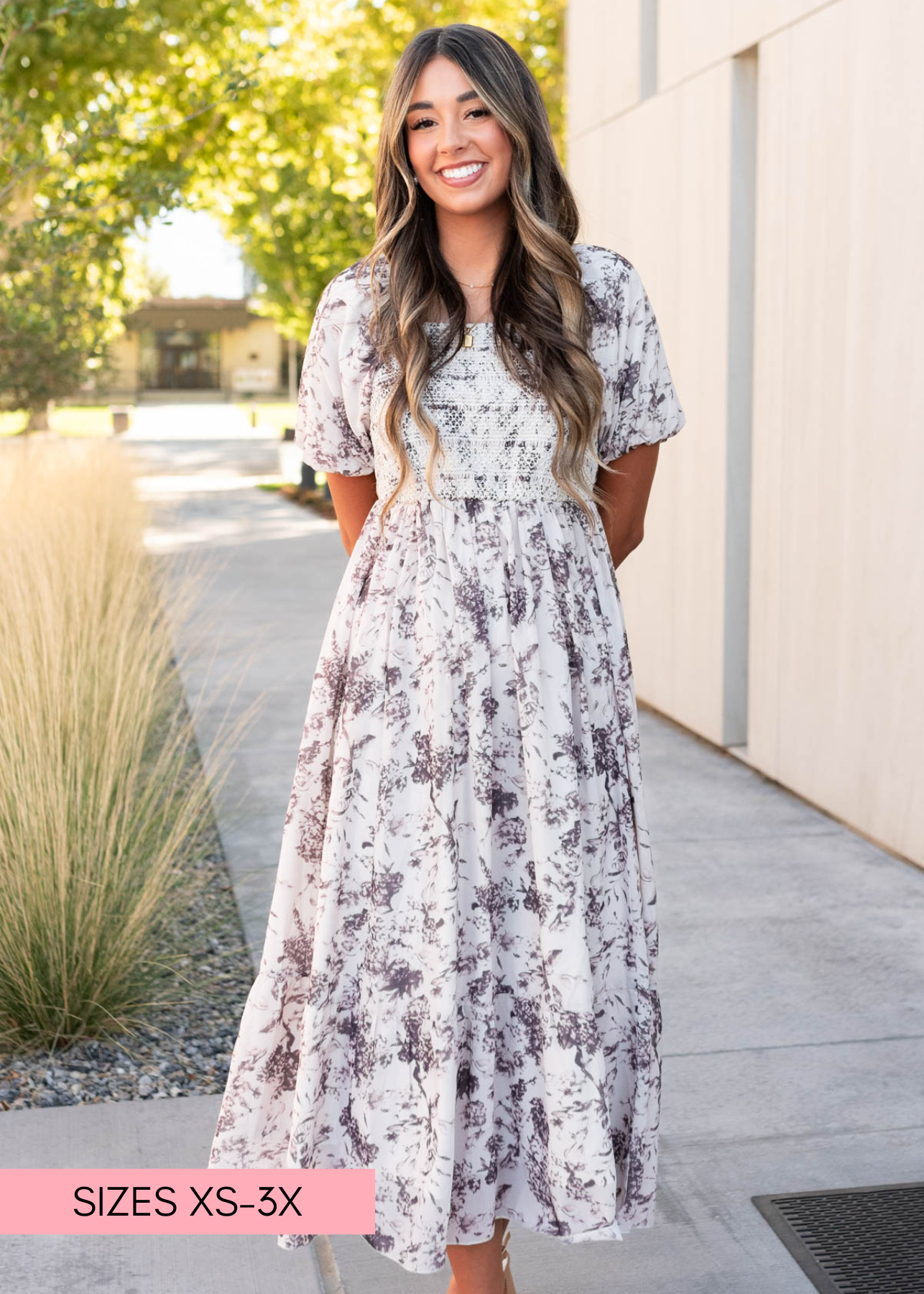 White smocking on the cream floral smocked dress