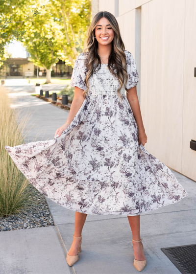 Cream floral smocked dress