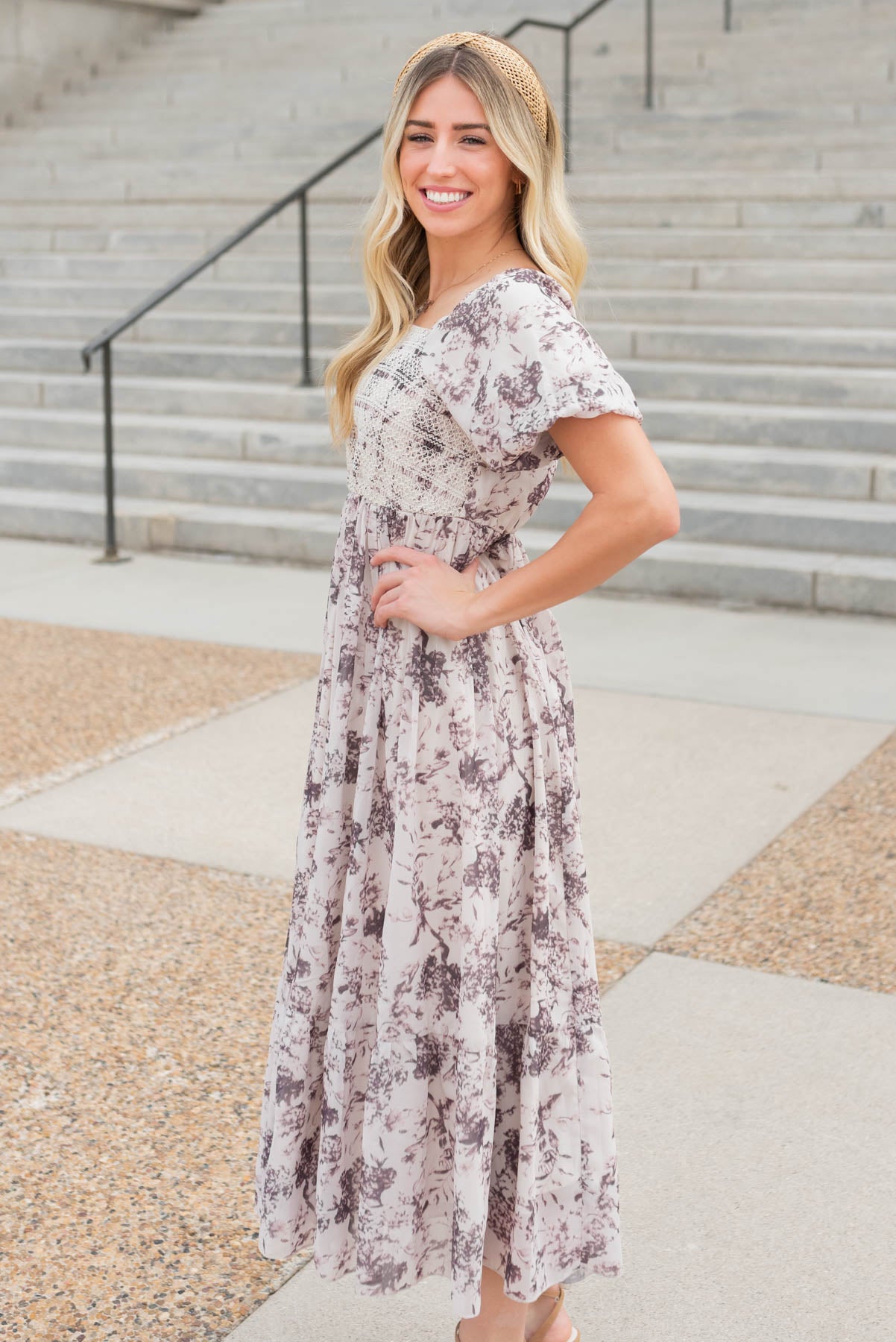 Side view of the cream floral smocked dress