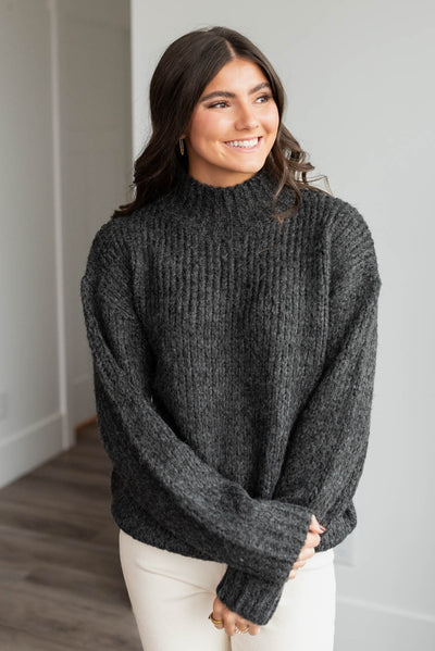 Black knit sweater with turtle neck