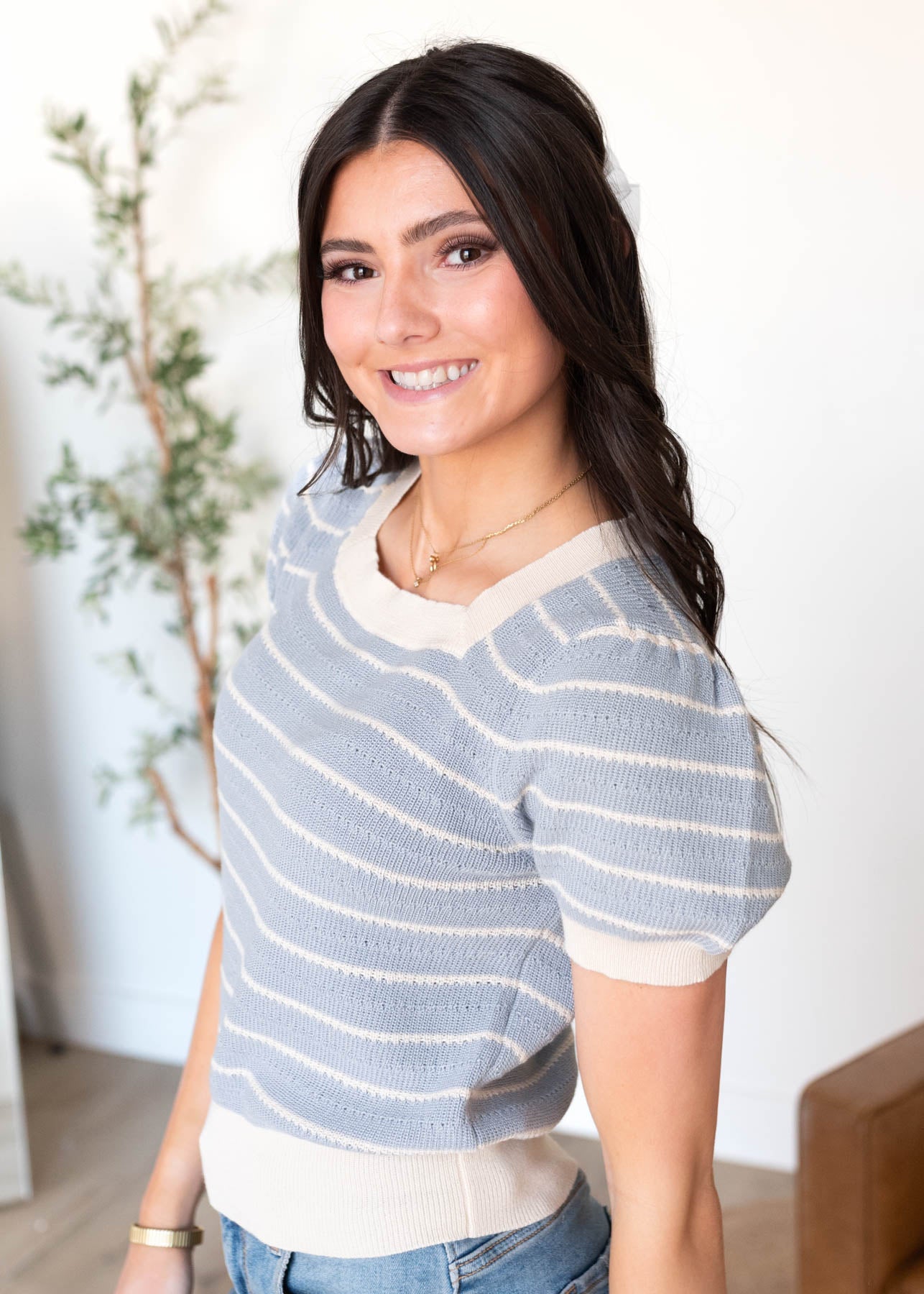 Side view of the blue stripe knit top