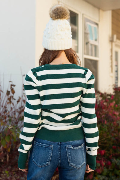 Back view of the hunter green striped sweater