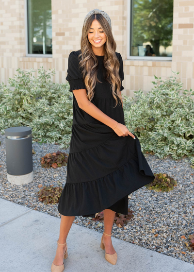 Tiered black dress with short sleeves