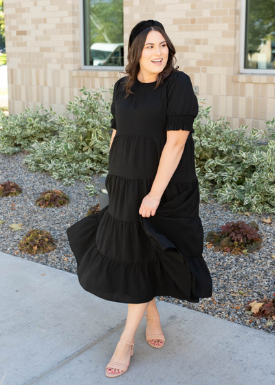 Short sleeve tiered black dress in plus size