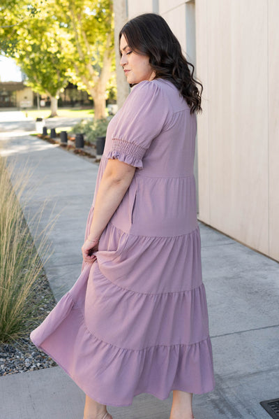 Side view of the plus size tiered dusty lilac dress