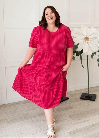 Plus size hot pink gingham tiered dress in a 3X