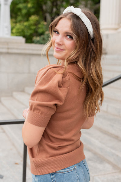 Side view of the camel puff sleeve sweater top