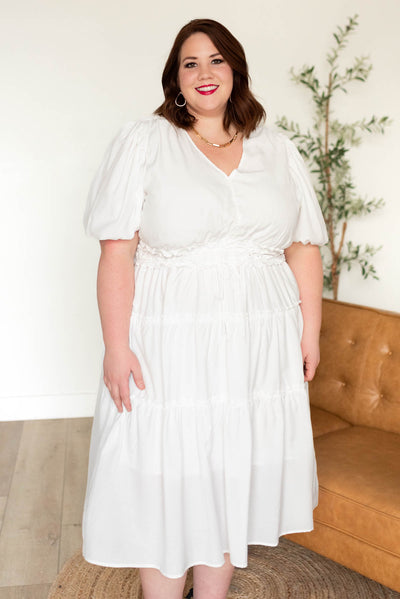 Plus size ivory v neck dress with tiered skirt