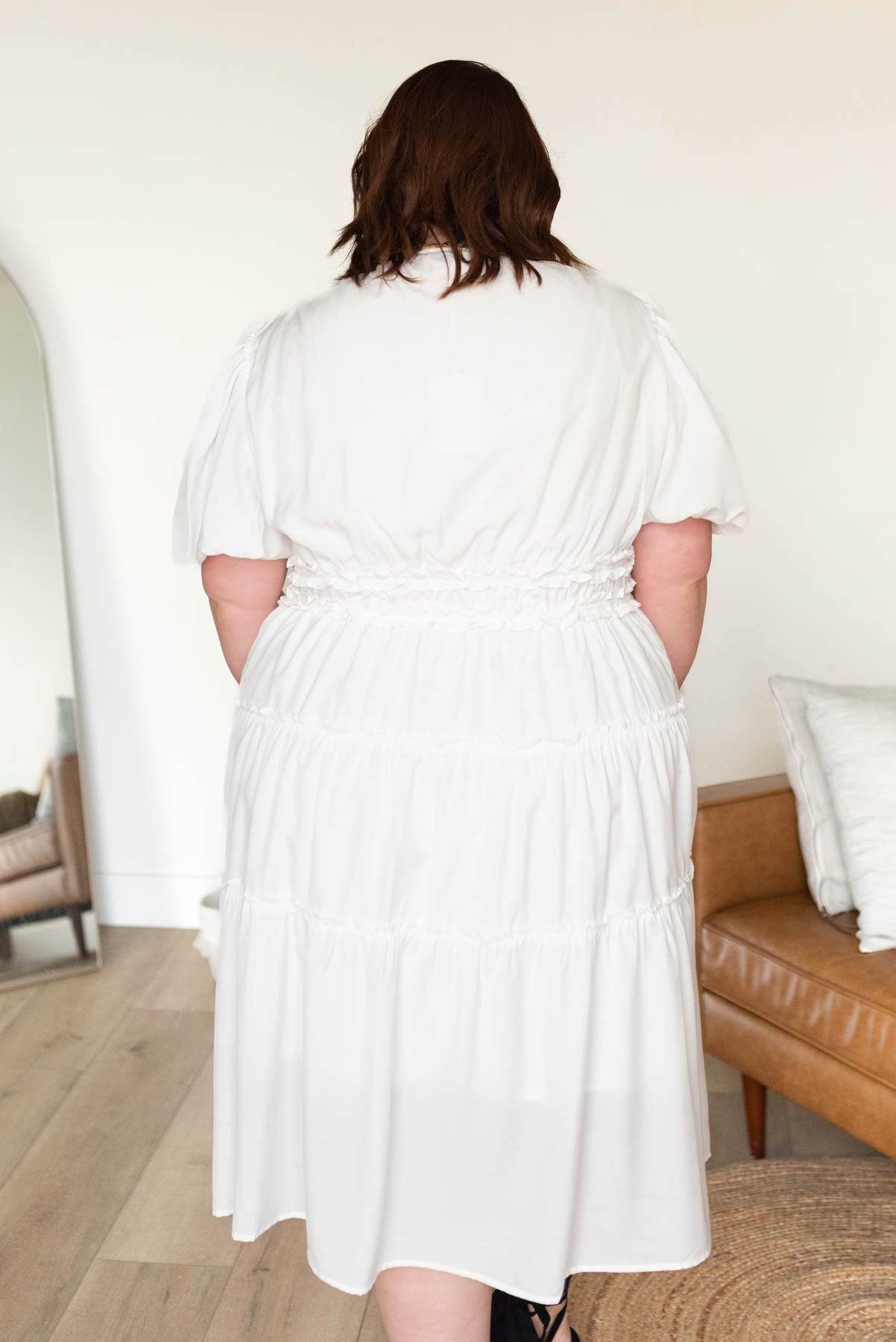 Back view of the plus size ivory v neck dress