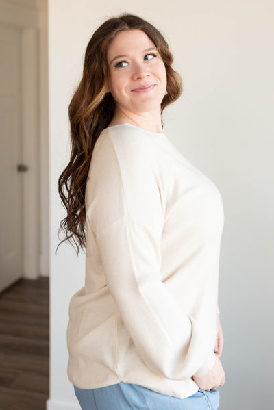 Side view of the oatmeal waffle long sleeve top in plus size