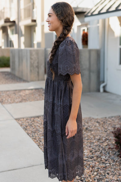 Side view of the charcoal embroidered dress