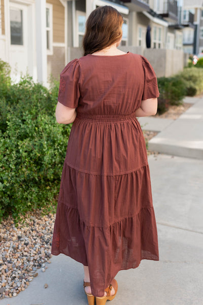 Back view of the burgundy embroidered detail dress in plus size