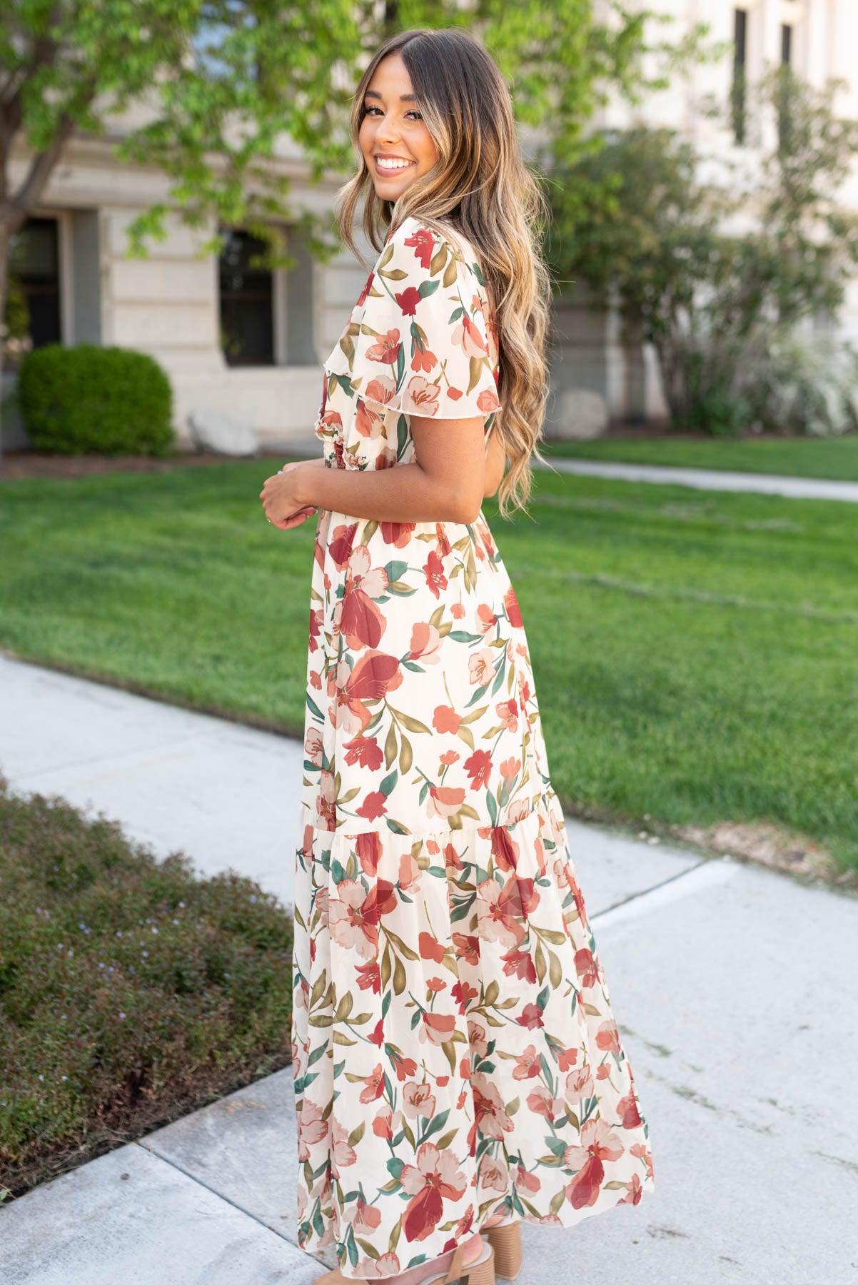 Side view of the multi floral maxi dress