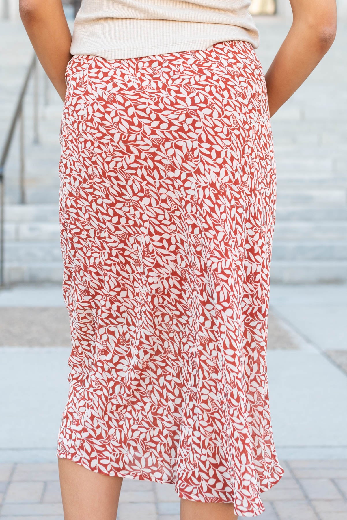 Back view of the rust floral knot skirt