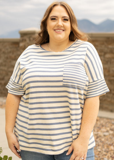 Plus size denim top with short sleeves and front pocket