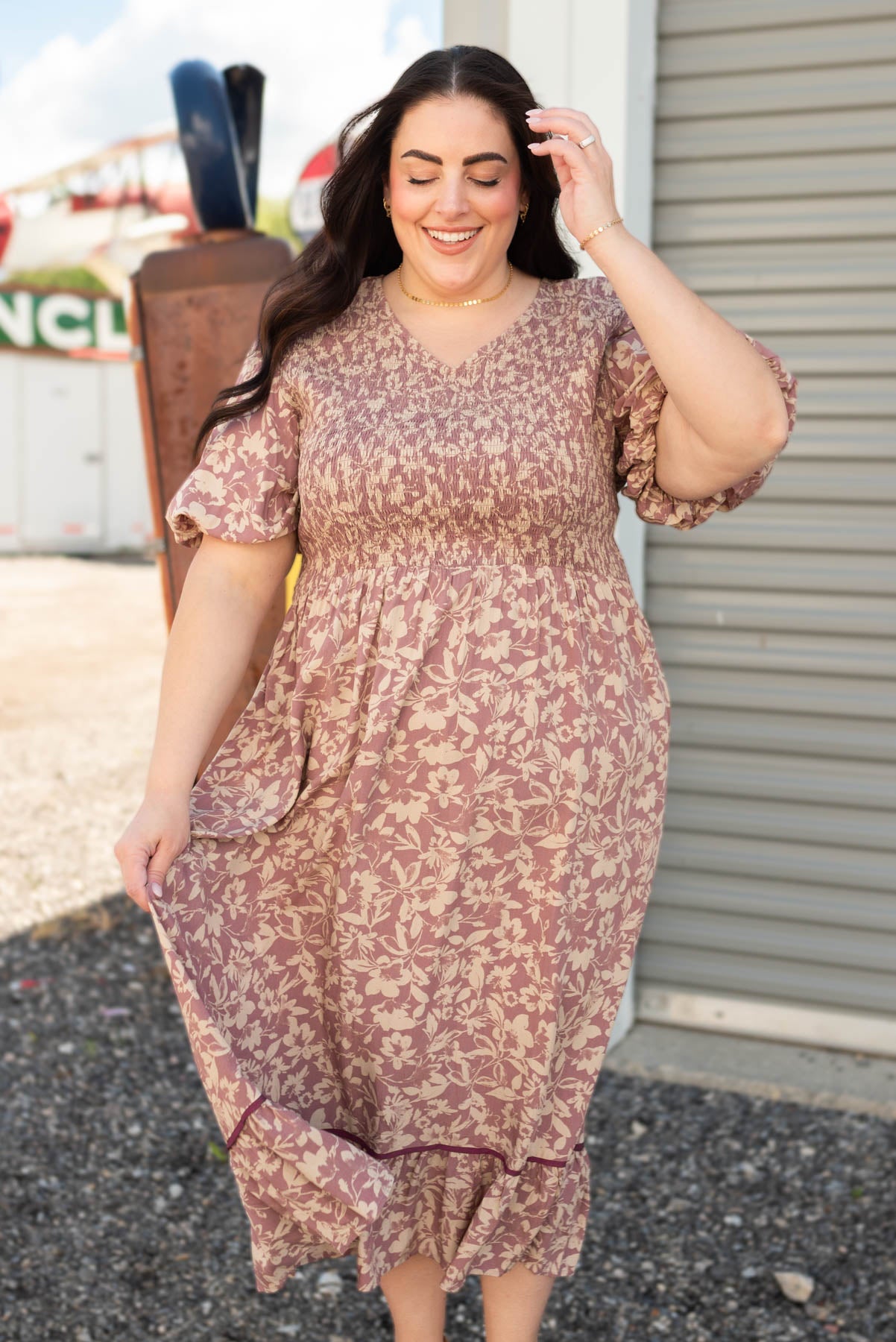 Front view of the dusty plum floral dress