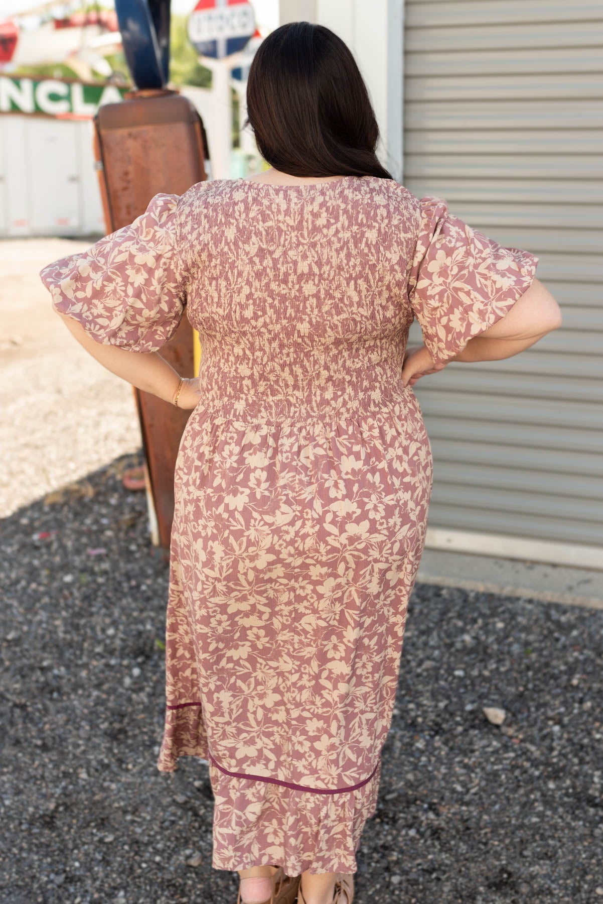 Back view of the dusty plum floral dress